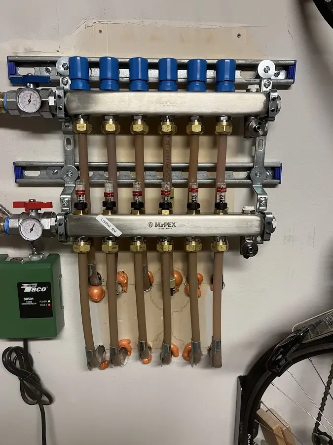 Plumber performing Gas Line Installation at a residential property in Marblehead